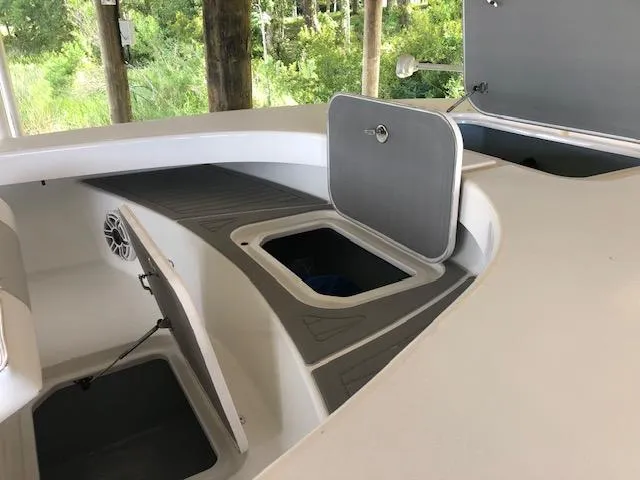 Slide: The Image of ZCB 2600 Freemason CC 2021 boat interior with open storage compartments. - 9