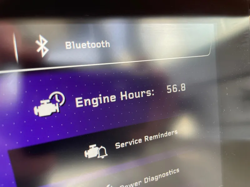 Slide: The Image of 2024 Nautique Super Air Nautique G25 Paragon display showing 56.8 engine hours. - 13