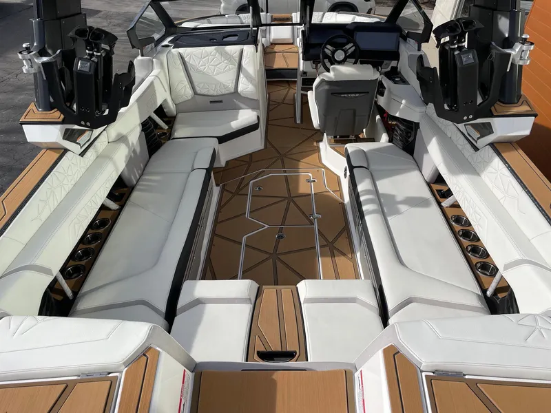 Slide: The Image of 2024 Nautique Super Air Nautique G25 Paragon interior with luxurious seating and modern design. - 5