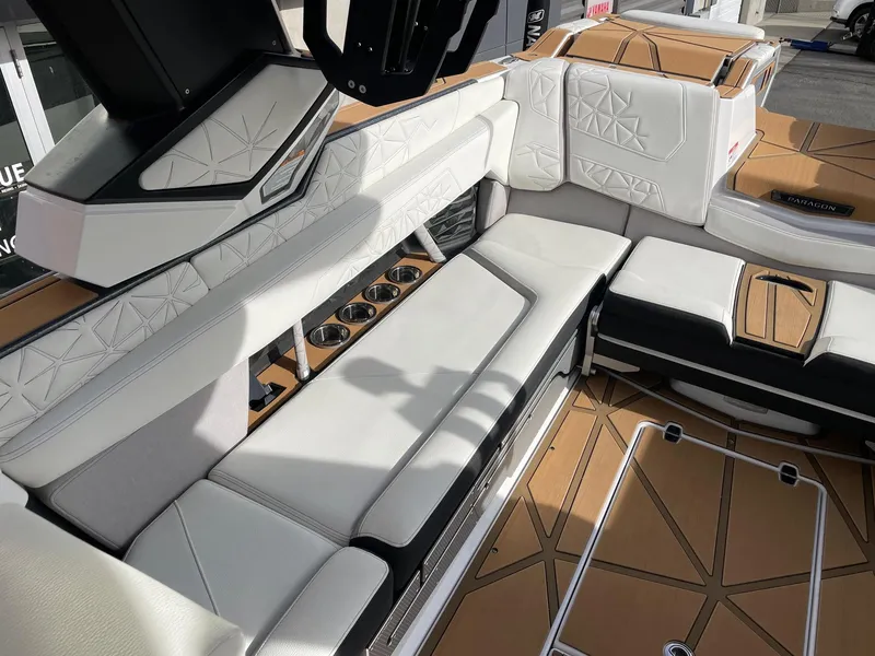 Slide: The Image of 2024 Nautique Super Air Nautique G25 Paragon interior with luxurious seating and modern design. - 7