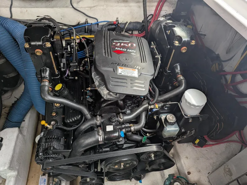 Slide: The Image of Engine compartment of a 2007 Crownline 340 CR boat with MerCruiser 350 MAG MPI engine. - 27