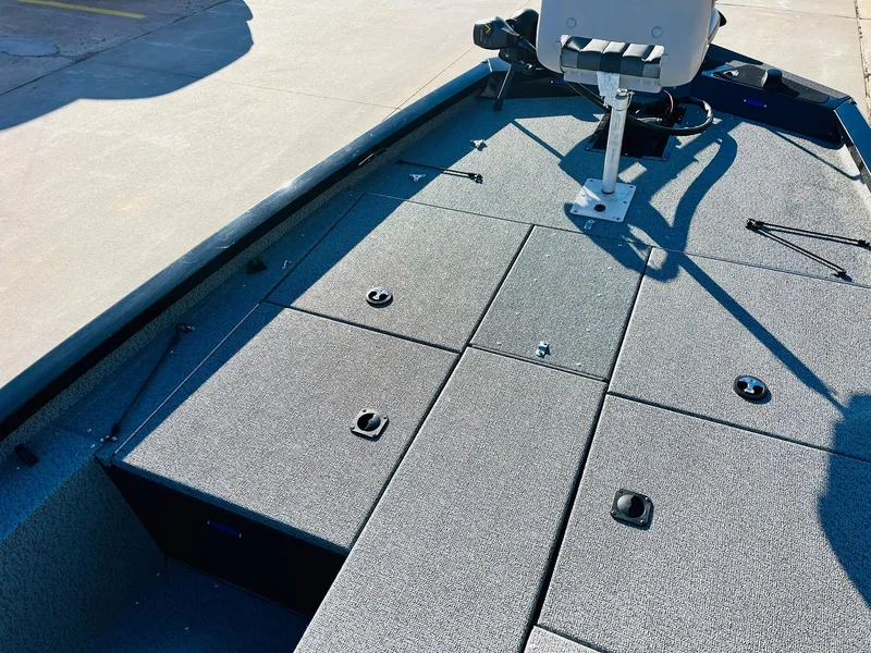 Slide: The Image of 2020 G3 Sportsman 1910 boat deck with storage compartments and seat. - 13