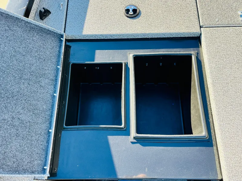 Slide: The Image of 2020 G3 Sportsman 1910 boat storage compartments, open and empty. - 18