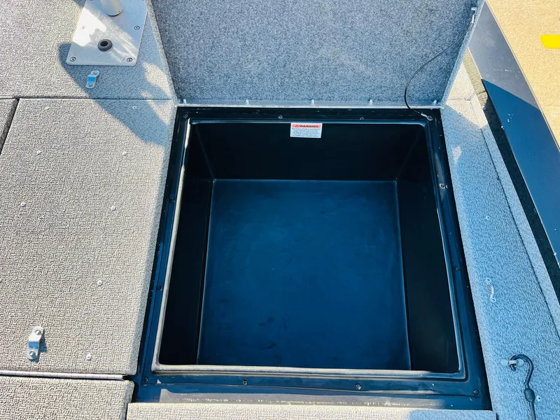 Slide: The Image of Open storage compartment on 2020 G3 Sportsman 1910 boat deck. - 20