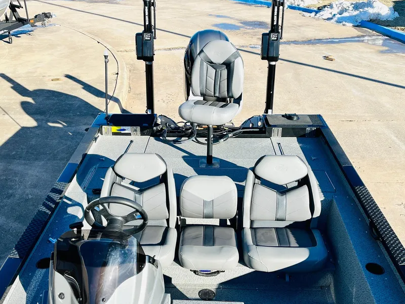 Slide: The Image of 2020 G3 Sportsman 1910 boat interior with four gray seats and steering console. - 25