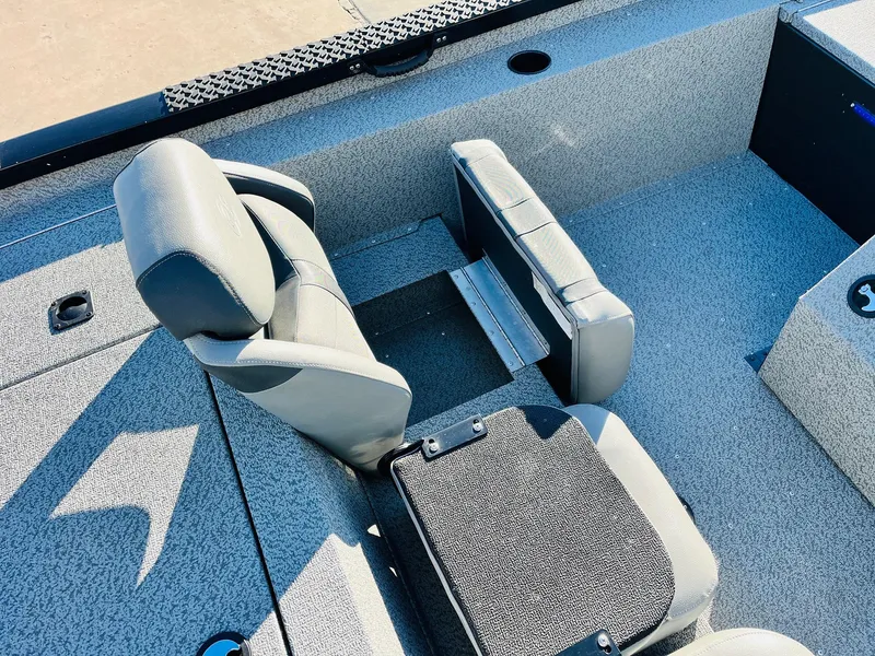 Slide: The Image of 2020 G3 Sportsman 1910 boat interior with gray seating and storage compartments. - 29