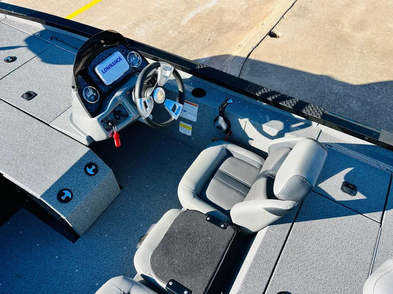 Slide: The Image of 2020 G3 Sportsman 1910 boat interior with steering console and seating. - 30