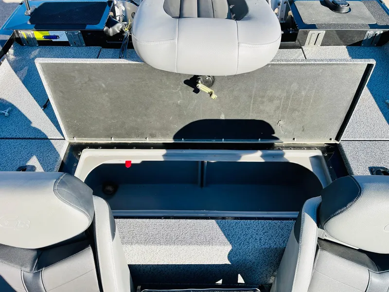 Slide: The Image of 2020 G3 Sportsman 1910 boat interior with open storage compartment and seating. - 35