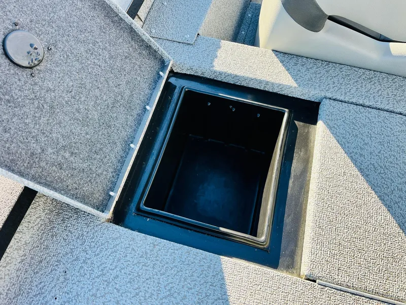 Slide: The Image of Open storage compartment on 2020 G3 Sportsman 1910 boat deck. - 39