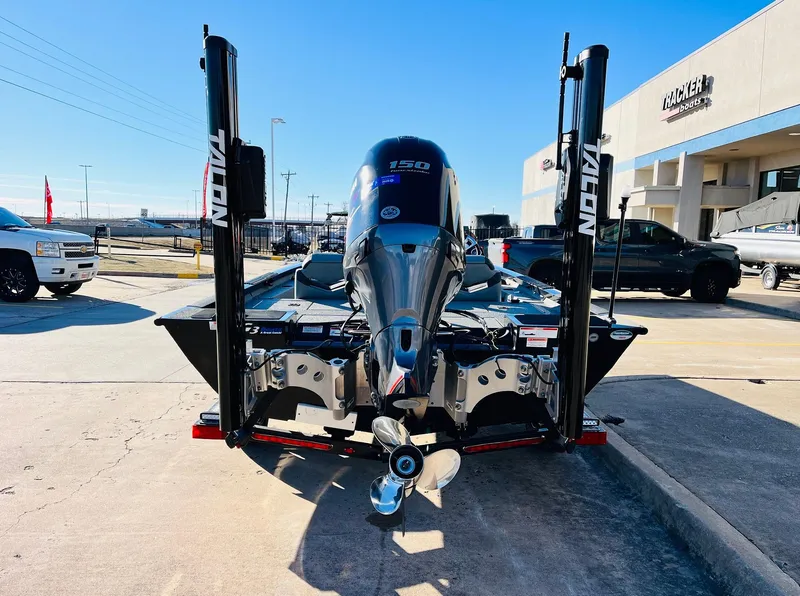 Slide: The Image of 2020 G3 Sportsman 1910 boat with powerful outboard motor, parked outdoors. - 6