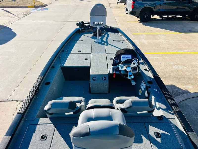 Slide: The Image of 2020 G3 Sportsman 1910 boat interior with steering console and seating. - 8