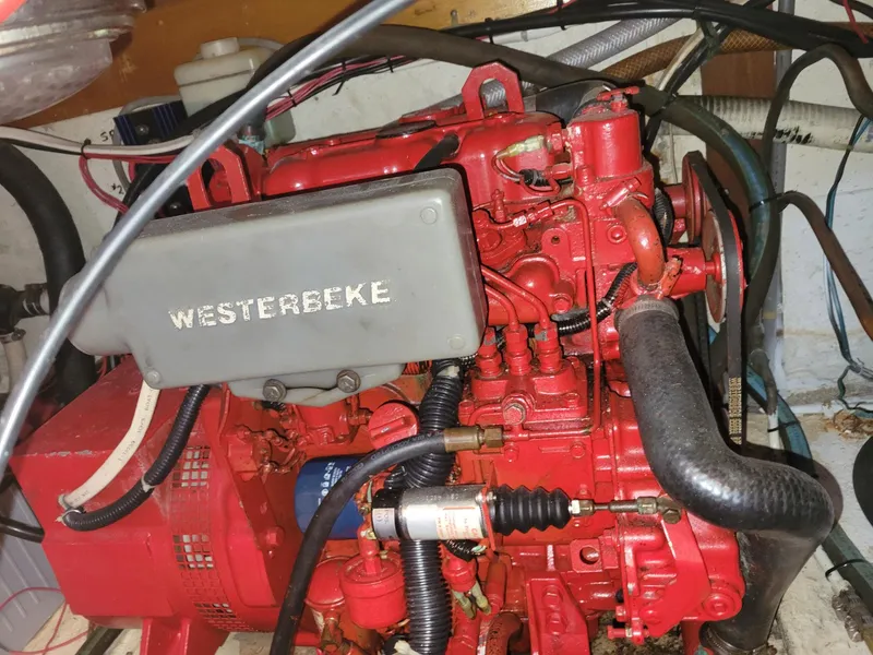 Slide: The Image of Red Westerbeke engine in 1983 Marine Trader 34 Trawler. - 31
