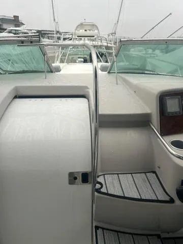 Slide: The Image of 2004 Formula 34 PC yacht with sleek deck and modern design. - 10