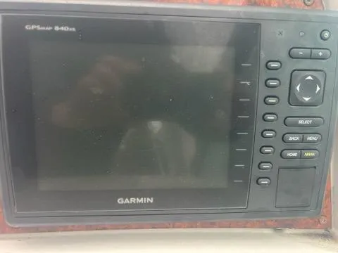 Slide: The Image of Garmin GPSmap 840xs on 2004 Formula 34 PC boat dashboard. - 11