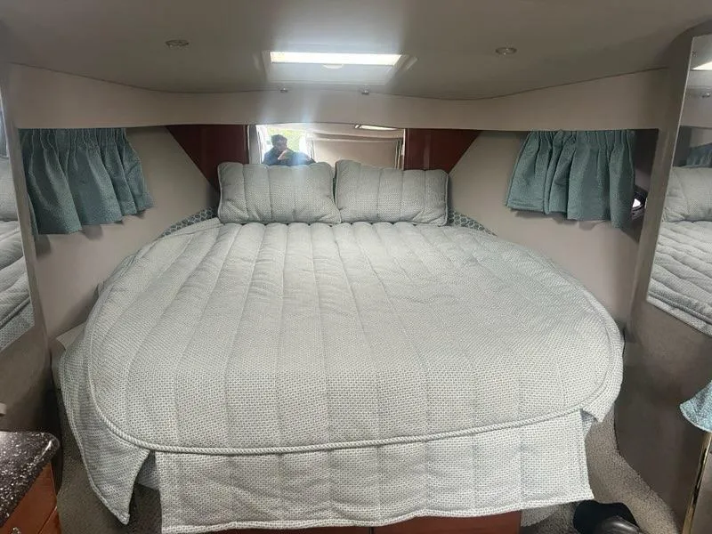 Slide: The Image of 2004 Formula 34 PC cabin with cozy bed and soft lighting. - 21