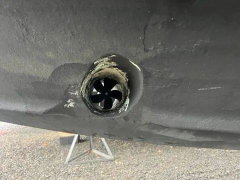 Slide: The Image of Close-up of a 2004 Formula 34 PC boat hull with a bow thruster. - 23