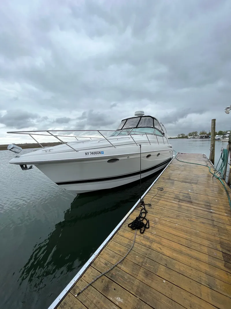 Slide: The Image of 2004 Formula 34 PC yacht docked on a cloudy day. - 5