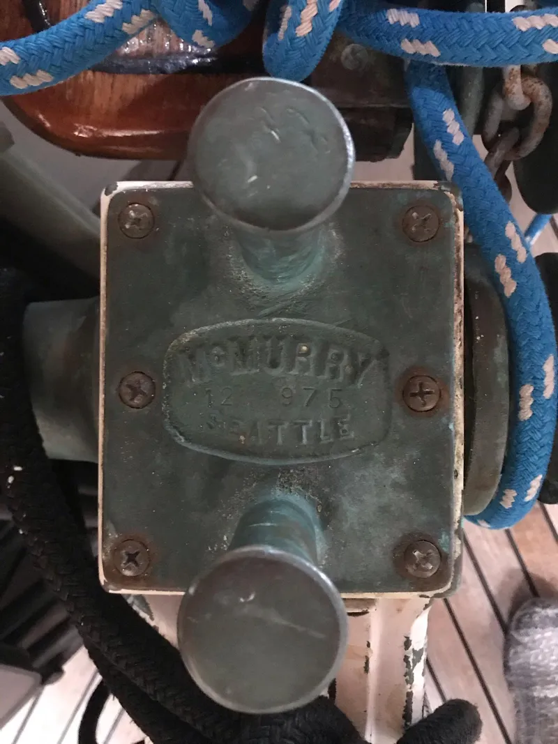 Slide: The Image of Close-up of a vintage 1969 Grand Banks 42 Classic boat component with ropes. - 46