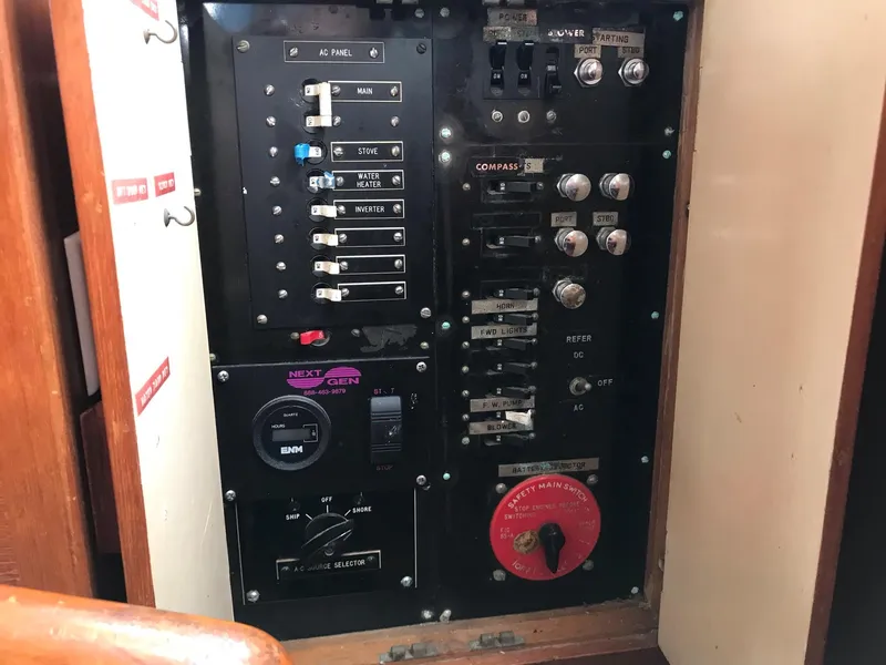 Slide: The Image of Electrical control panel on a 1969 Grand Banks 42 Classic boat. - 9