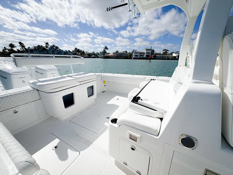 Slide: The Image of 2023 HCB 39 Speciale boat interior with luxurious seating and ocean view. - 14