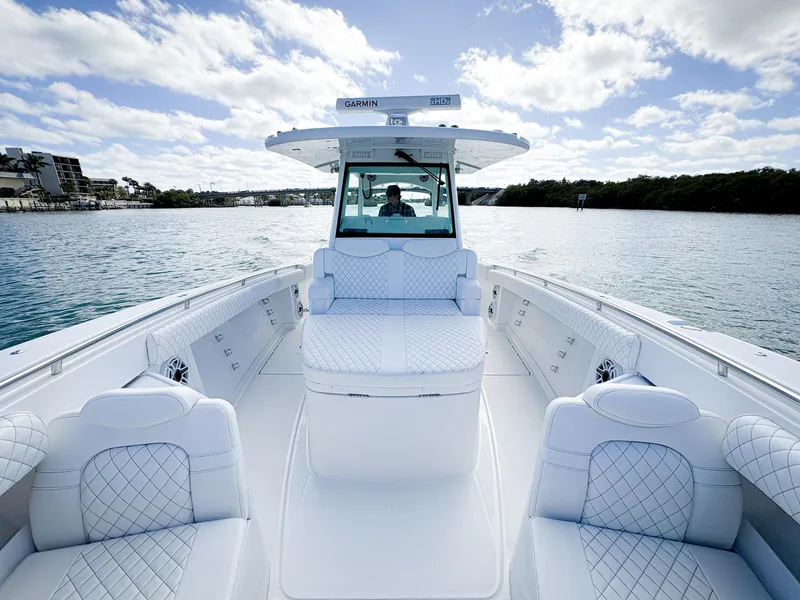 Slide: The Image of 2023 HCB 39 Speciale boat with luxurious seating on a sunny day. - 26