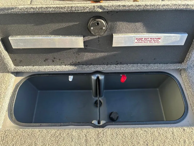 Slide: The Image of 2024 Ranger RT188P boat storage compartment with pump-out feature. - 19