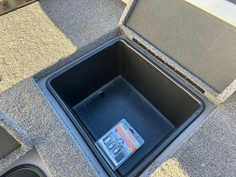 Slide: The Image of 2024 Ranger RT188P boat storage compartment with packaging inside. - 20
