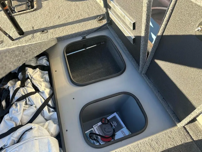Slide: The Image of 2024 Ranger RT188P boat storage compartments with gear and accessories. - 30