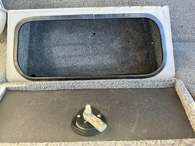 Slide: The Image of 2024 Ranger RT188P boat storage compartment with latch detail. - 31