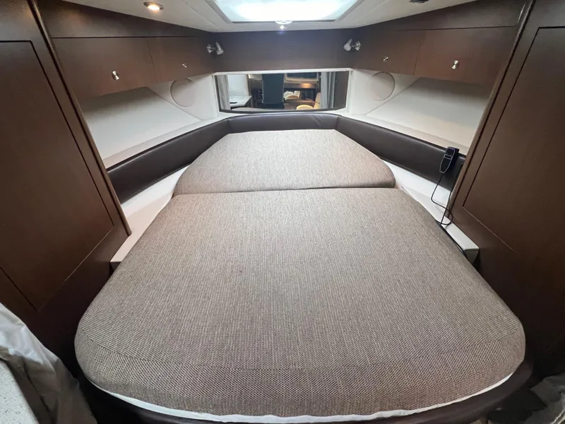 Slide: The Image of Luxurious cabin interior of 2016 Sea Ray 370 Sundancer yacht with cozy bed. - 31