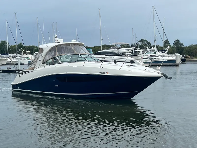 Slide: The Image of 2016 Sea Ray 370 Sundancer yacht docked in marina. - 7