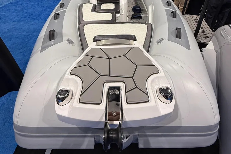 Slide: The Image of Highfield Sport 560 boat, 2025 model, featuring sleek design and modern seating. - 12
