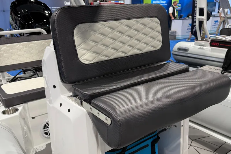 Slide: The Image of Highfield Sport 560 boat seat, 2025 model, featuring diamond-patterned upholstery. - 6