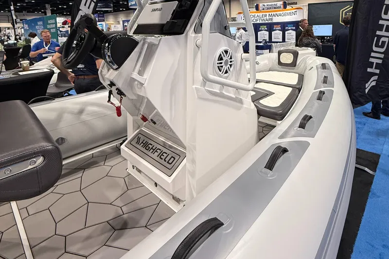 Slide: The Image of 2025 Highfield Sport 560 boat interior at a marine exhibition. - 8