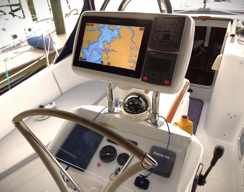 Slide: The Image of Beneteau 411 yacht cockpit with navigation equipment, 2002 model. - 16