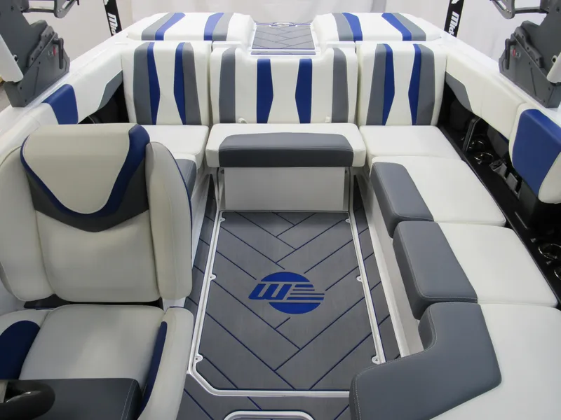 Slide: The Image of Interior of 2025 Malibu Wakesetter 22 LSV boat with stylish seating and flooring. - 10