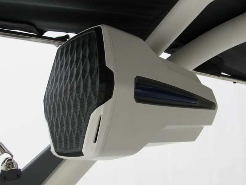 Slide: The Image of 2025 Malibu Wakesetter 22 LSV boat speaker, sleek design, mounted on a support bar. - 11