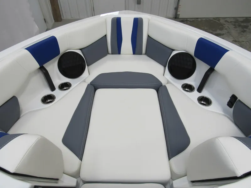 Slide: The Image of 2025 Malibu Wakesetter 22 LSV interior with blue and gray seating. - 9