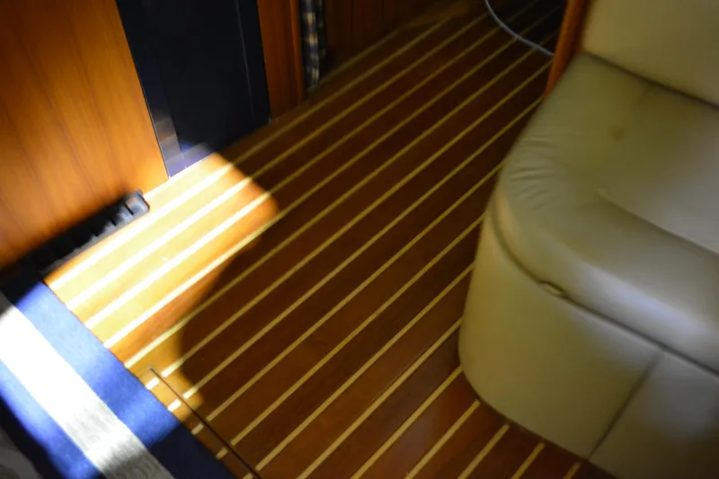 Slide: The Image of Electrical control panel on a 1999 Pursuit 3400 Express boat, featuring DC and AC systems. - 30