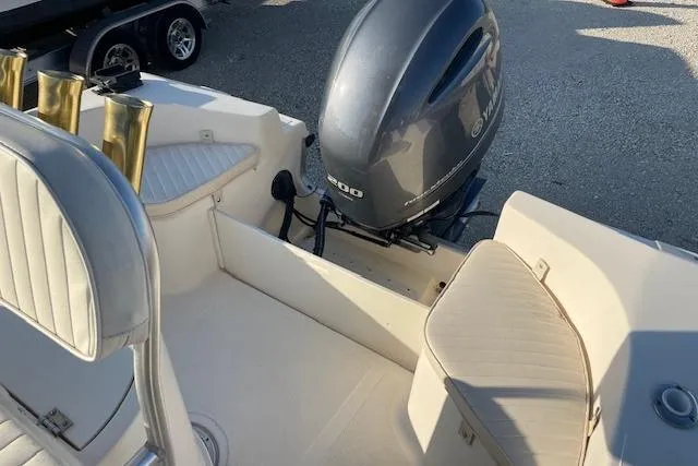 Slide: The Image of 2005 KenCraft 206 boat interior with Yamaha outboard motor, featuring cushioned seating and rod holders. - 11