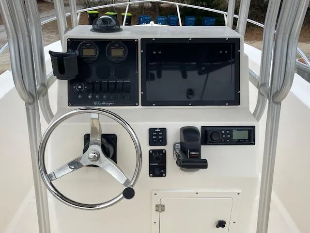 Slide: The Image of 2005 KenCraft 206 boat cockpit with steering wheel and control panel. - 3