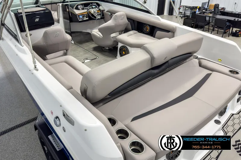 Slide: The Image of 2025 Four Winns HD3 boat interior with modern seating and dashboard design. - 11