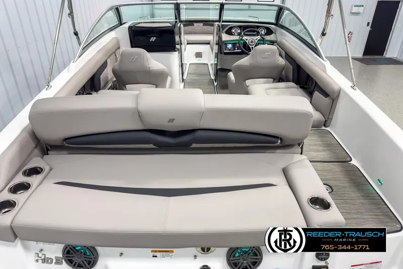 Slide: The Image of 2025 Four Winns HD3 boat interior with modern seating and dashboard design. - 13