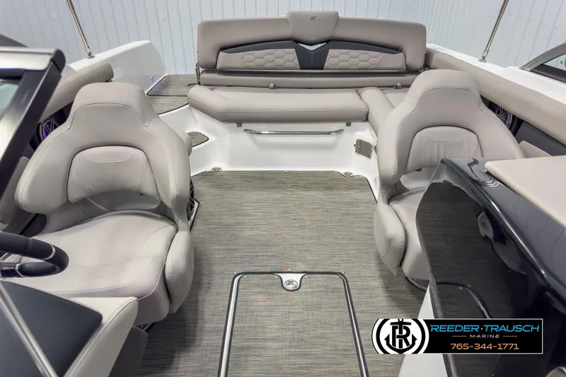 Slide: The Image of Interior of 2025 Four Winns HD3 boat with luxurious seating and modern design. - 18