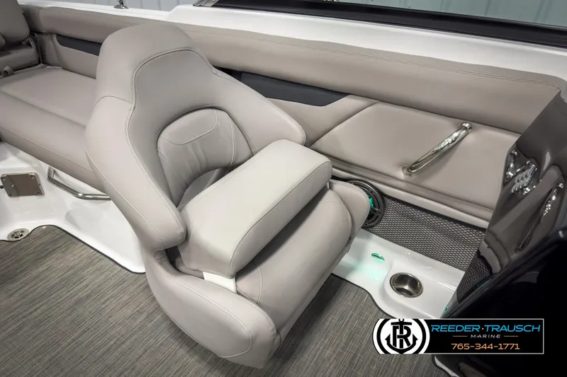 Slide: The Image of 2025 Four Winns HD3 boat interior with luxurious gray seating and modern design elements. - 24