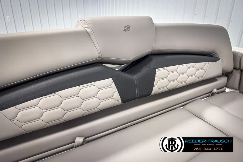 Slide: The Image of 2025 Four Winns HD3 boat interior with stylish, hexagonal-patterned upholstery and sleek design. - 38