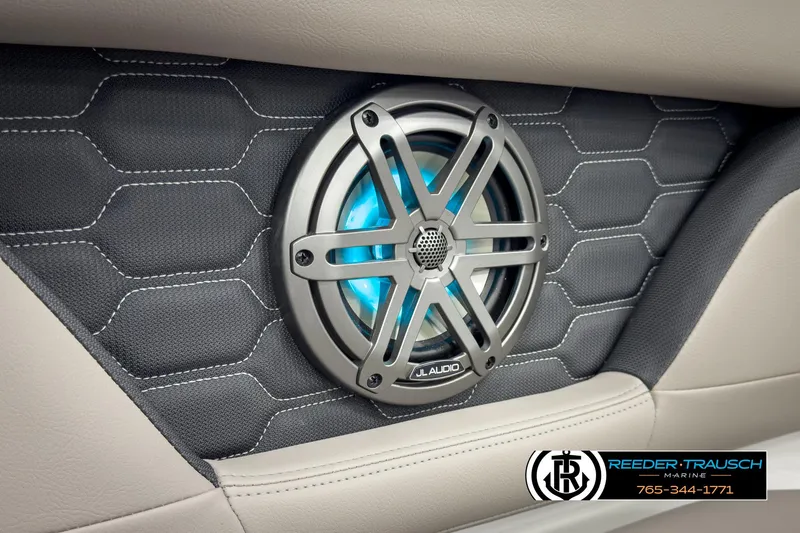 Slide: The Image of 2025 Four Winns HD3 boat interior with JL Audio speaker and stylish upholstery. - 39