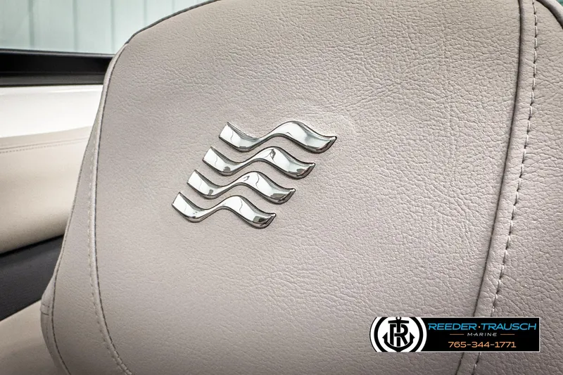 Slide: The Image of 2025 Four Winns HD3 boat seat with logo, featuring Reeder-Trausch Marine branding. - 43