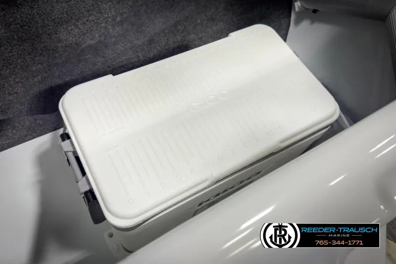 Slide: The Image of White cooler in a 2025 Four Winns HD3 boat storage compartment. - 45