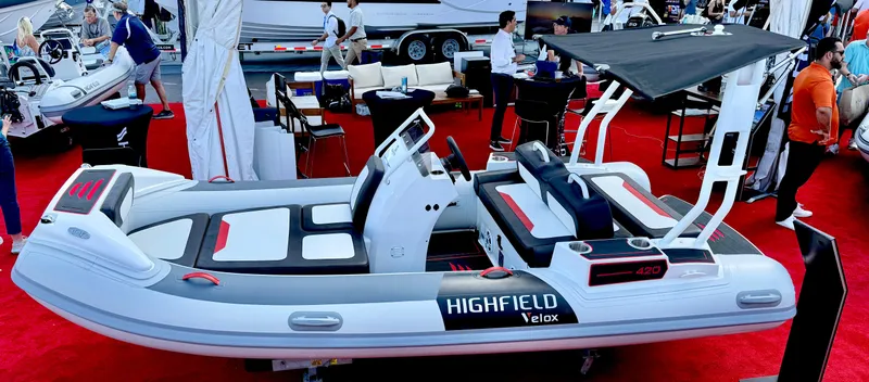 The Image of 2025 Highfield Velox 420 boat displayed at a marine exhibition. - 0